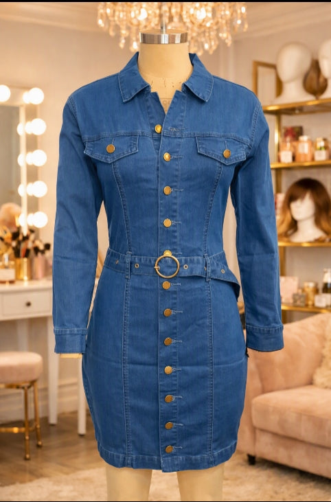 Blue long sleeve denim shirt dress with gold button front, lapel collar, and gold ring belt buckle