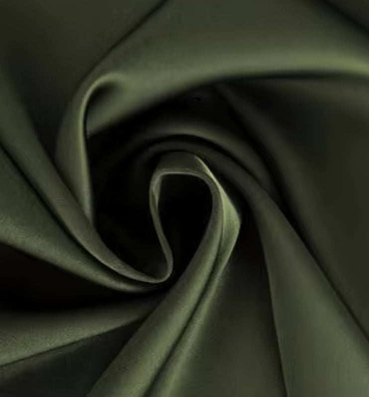 Close-up of olive green woven polyester fabric with a smooth, lustrous finish