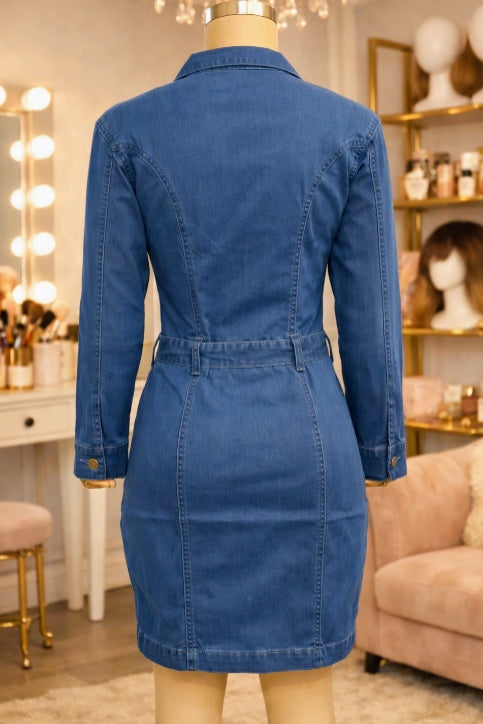 Blue long sleeve denim shirt dress with gold button front, lapel collar, and gold ring belt buckle