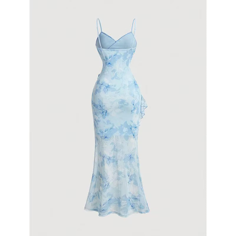 Sky blue floral print ruffle trim mermaid maxi cami dress with sweetheart neckline, product view on grey background

