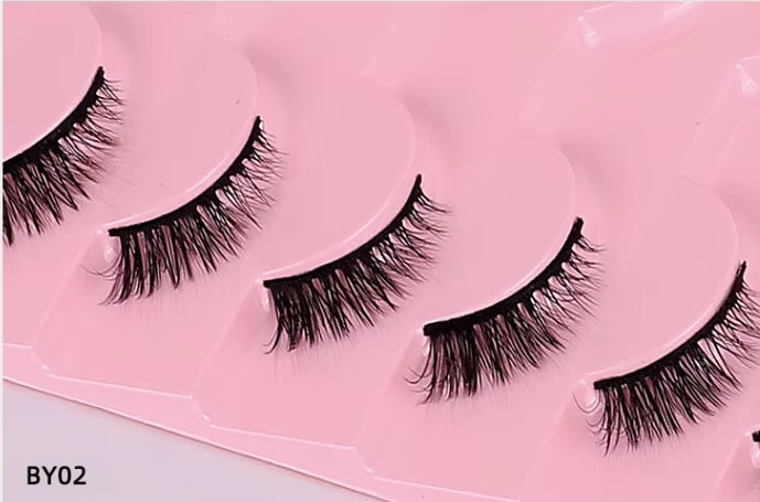 Four pairs of black false eyelashes arranged on a pink tray, with the text 'BY02' in the bottom-left corner.