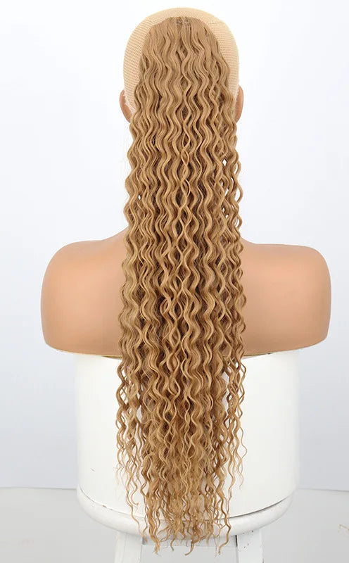 Image 3 — Water wave synthetic drawstring ponytail — Natural Black (1B), back view on mannequin with cap detail
