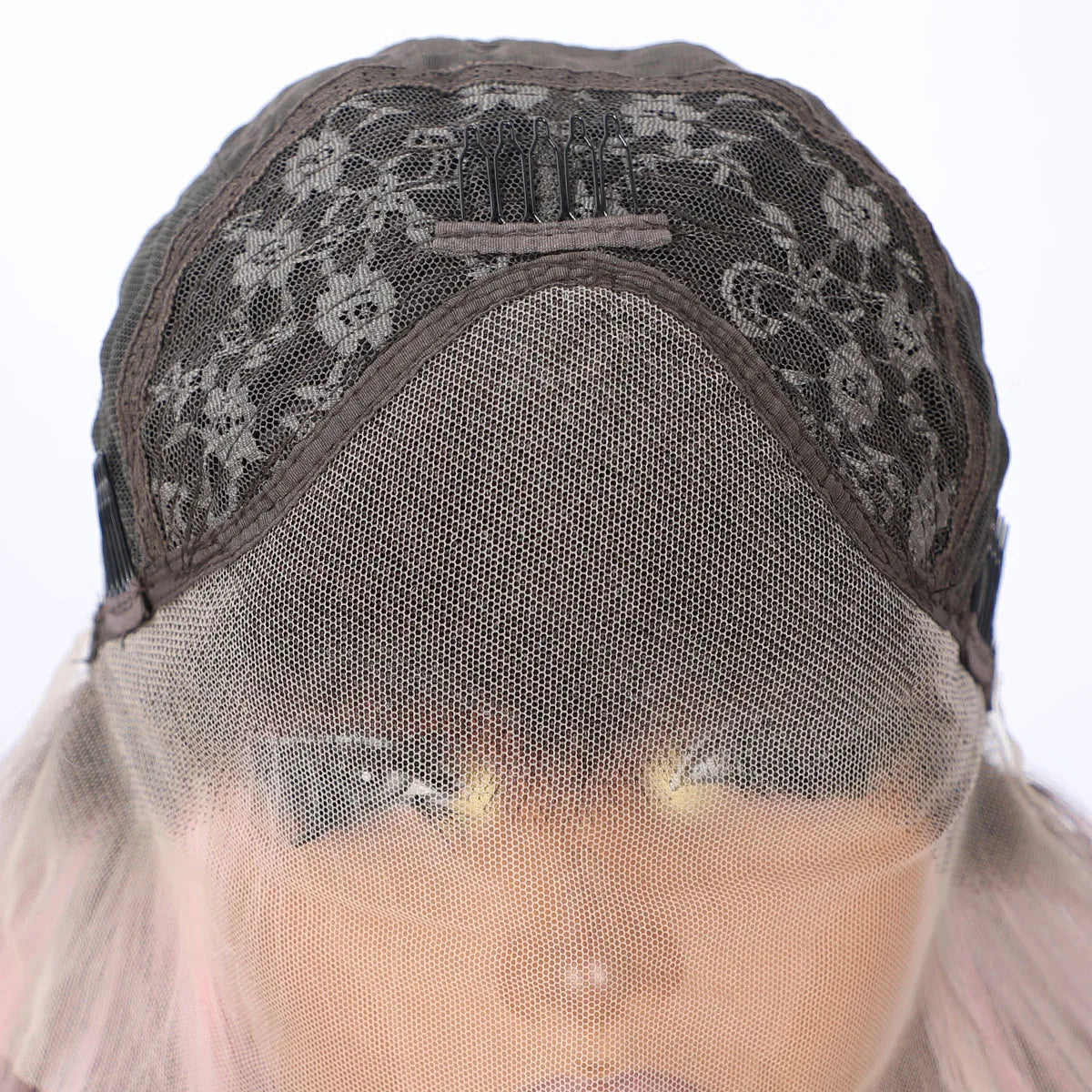 Top view showing cap construction and density of platinum pink wavy wig