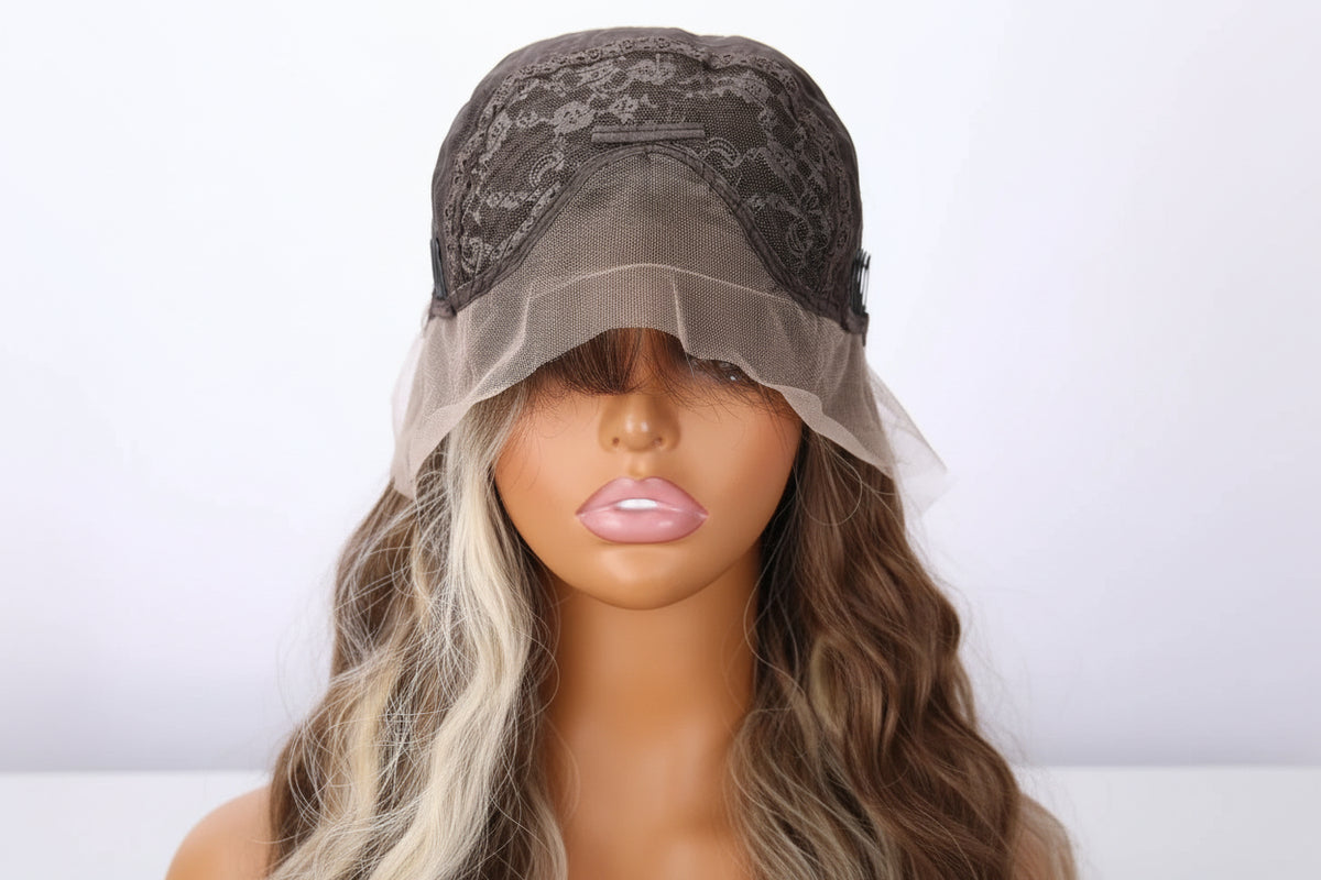 Close-up of 13x3 transparent lace hairline on ash brown to blonde wig