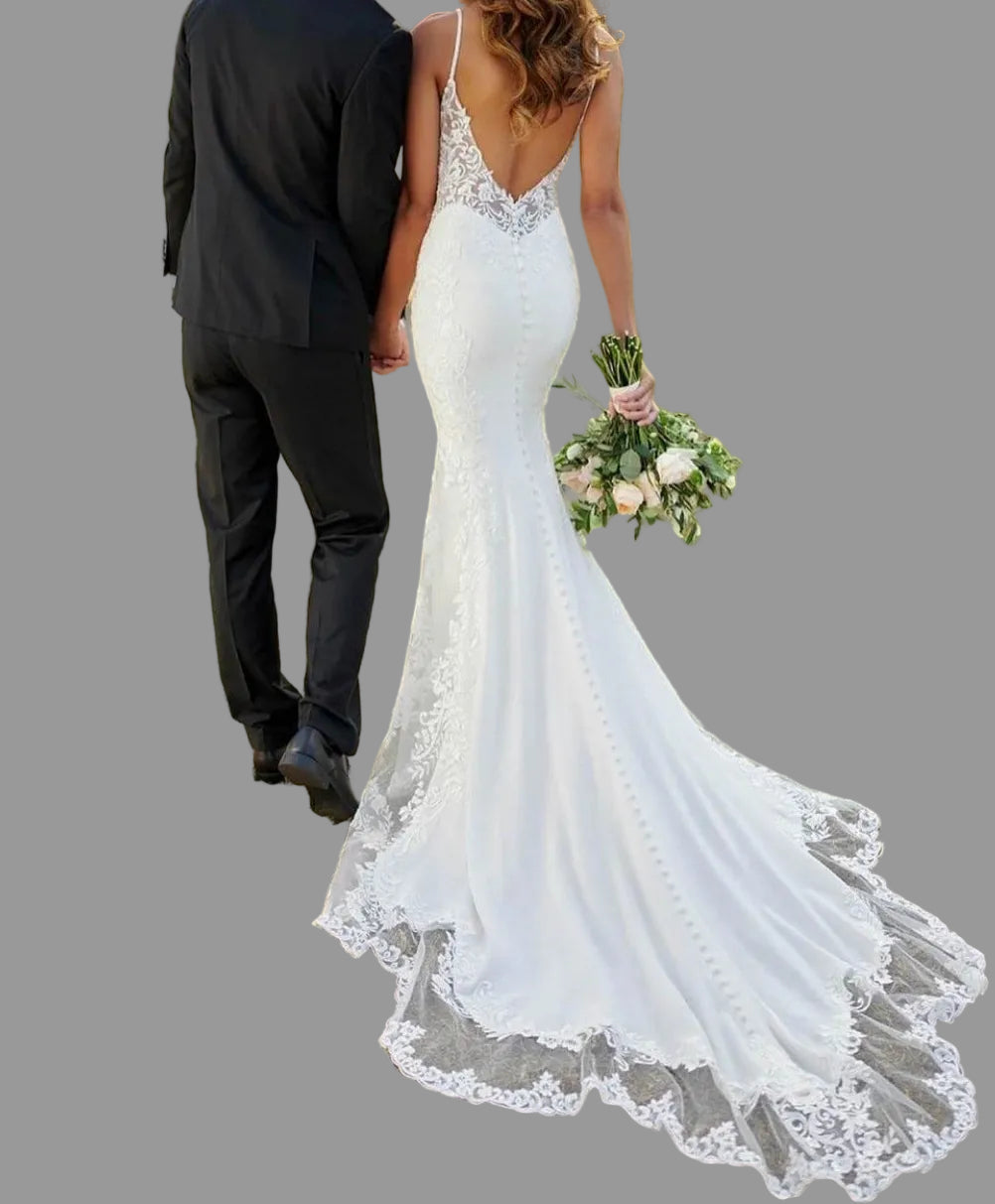 Backless lace bridal gown with sweep train
