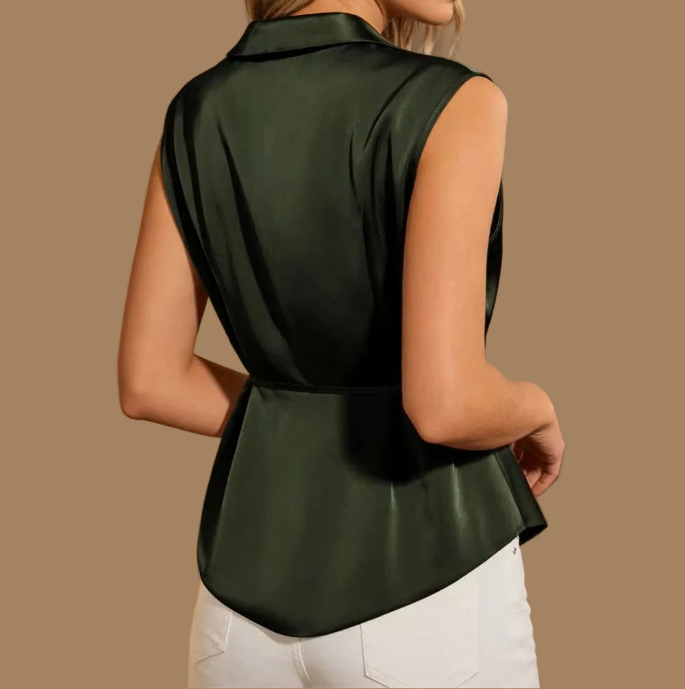 olive green wrap-style blouse with a collar and side tie back