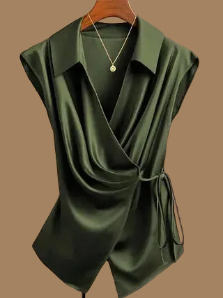 olive green wrap-style blouse with a collar and side tie