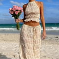 Women's beige halter top and maxi skirt two-piece beachwear set