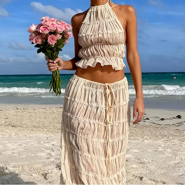 Women's beige halter top and maxi skirt two-piece beachwear set