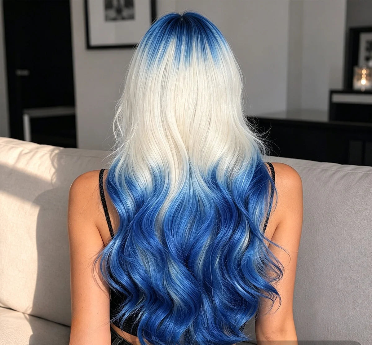 Image 2: Side view of long wavy blue gradient platinum synthetic wig showing full ombre from platinum roots to ocean blue ends, 26 inch