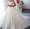 Elegant lace ball gown wedding dress with sweetheart neckline and court train