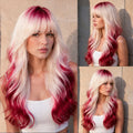 Image 1 (front/side): Long wavy red gradient pink synthetic wig with soft curtain bangs, platinum to red ombre, 26 inch, worn by model
