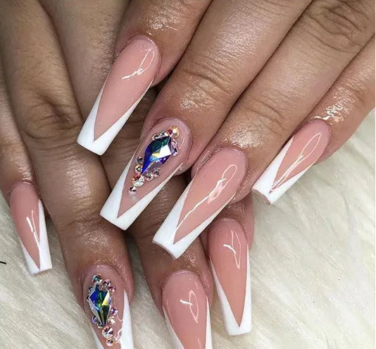 Nail art set shown on a hand with long almond-shaped nails in a nude pink and white French tip design, plus one decorated nail with iridescent rhinestones. A small inset shows the individual nail wraps, and the main image includes the text '#1725' and a curved arrow pointing to the decorated nail.