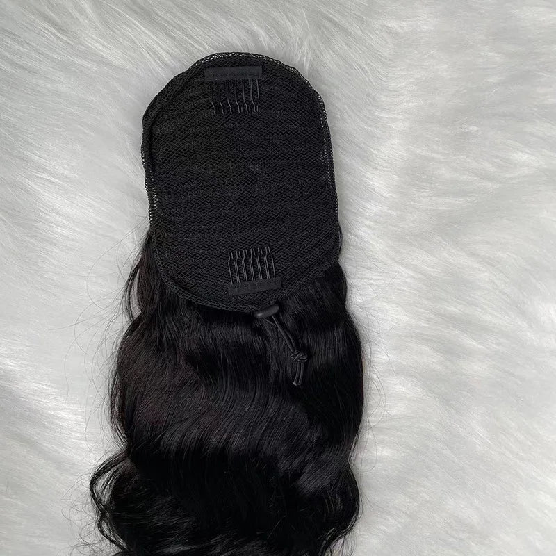 Image 2 — Body wave human hair drawstring ponytail cap detail showing combs and drawstring closure, flat lay on white fur
